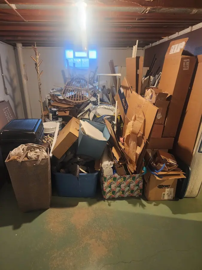 Roll-off dumpster container at job site for 4 Yard Dumpster Rental in Bethel